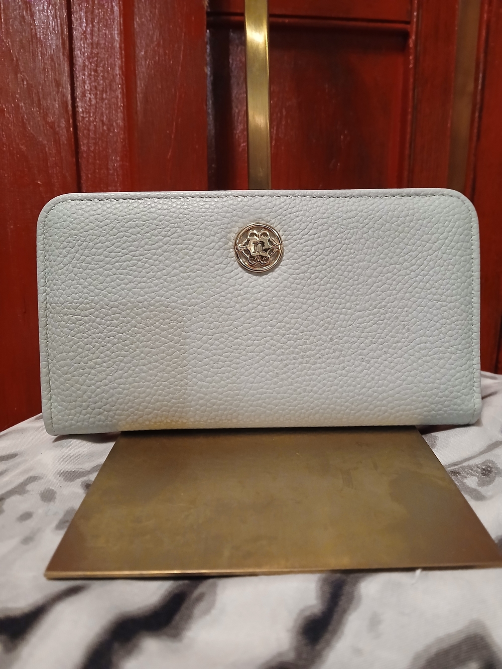 Nanette Lepore Pebbled Zip Wallet in Pale Blue with Gold Logo